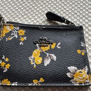 Coach Black and Yellow Floral Key Fob and Change holder.